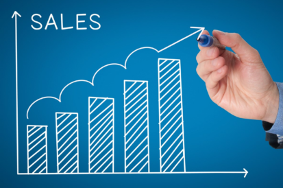 hand drawing a sales chart