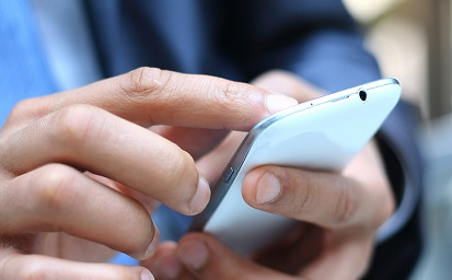 Man holding a phone with two hands